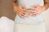 woman holding stomach.jpg